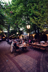 Relaxed atmosphere at Brandauer's Schlossbräu, ideal for enjoying local brews.