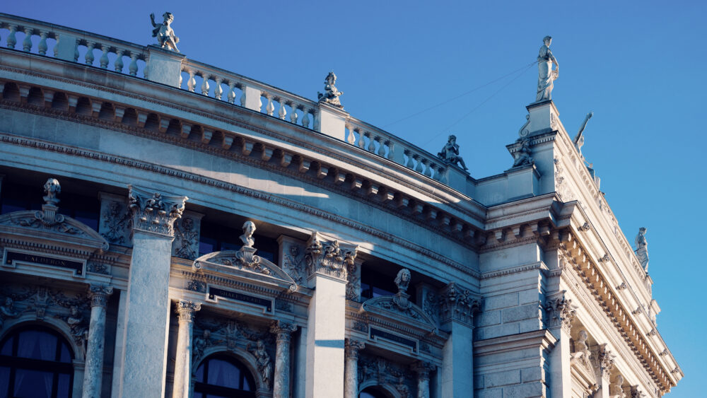 Intricate architectural details of the Burgtheater, a cultural icon in Vienna.