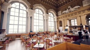 Café Gloriette's inviting indoor seating area, overlooking Schönbrunn Palace gardens.