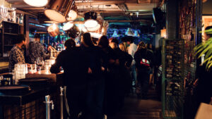 Creative cocktails and vibrant decor at Der Dachboden, embodying Vienna's trendy nightlife.