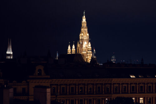 Stunning view of Vienna's Rathaus from Der Dachboden rooftop bar, capturing the city's iconic architecture.