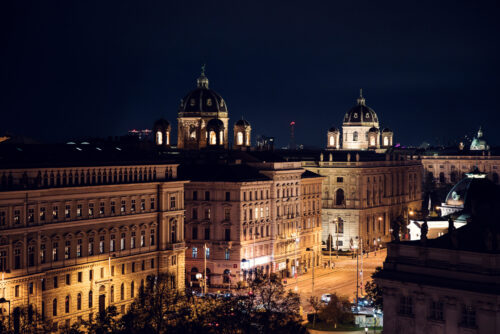 Evening view from Der Dachboden, where the city lights of Vienna create a magical setting.
