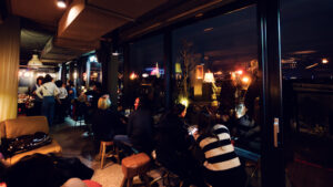 Der Dachboden offers comfortable seating, providing a relaxing spot to enjoy Vienna's vibrant rooftop atmosphere.