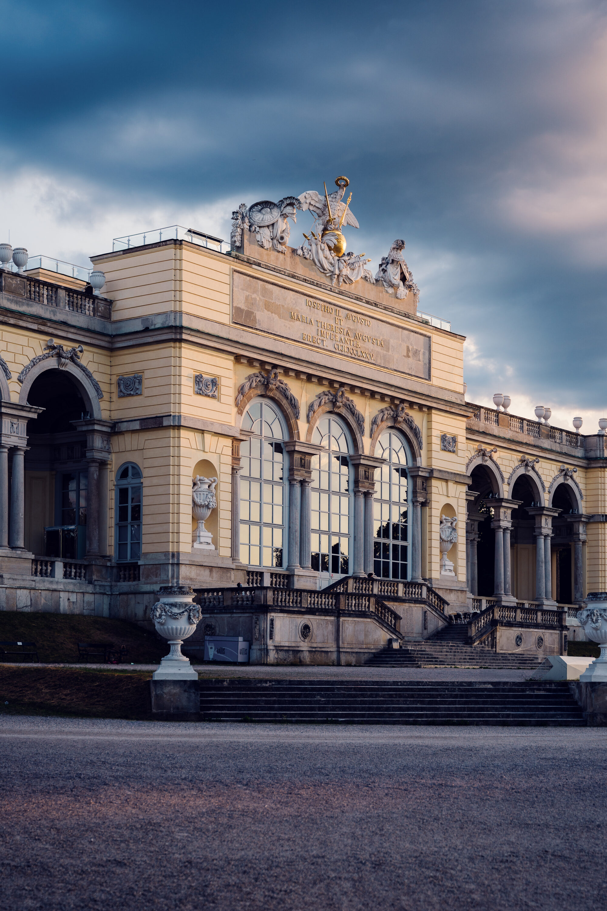Gloriette monument at Schönbrunn Palace during golden hour lighting.