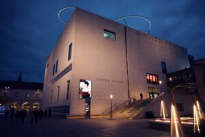 Aerial view of Leopold Museum's white cubic structure within the MuseumsQuartier Vienna, showing its modern architectural footprint.