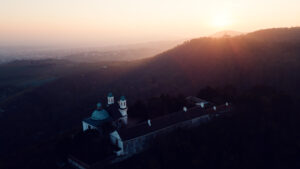 Sunset silhouette of Leopoldsberg's distinctive profile.