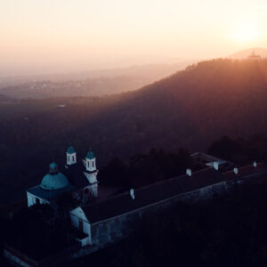 Sunset silhouette of Leopoldsberg's distinctive profile.