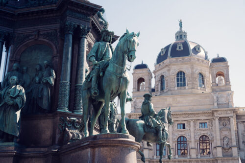 Historic reliefs at Maria Theresa Monument base, depicting scenes from the empress's reign.