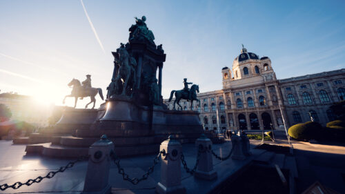 Imposing Maria Theresa Monument framed by twin museum buildings at Maria-Theresien-Platz.
