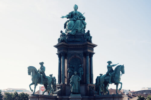 Architectural details of supporting sculptural groups and figures.