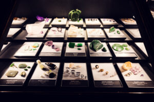 Mineral stone collection at Natural History Museum Vienna (Naturhistorisches Museum Wien), displaying precious gems and crystalline specimens in mineralogy hall on Maria-Theresien-Platz.