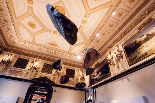 Meteorite collection display at Natural History Museum Vienna (Naturhistorisches Museum Wien), showcasing space rocks and celestial specimens in mineralogy exhibition on Maria-Theresien-Platz.