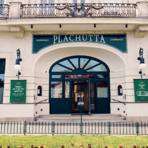 Distinguished entrance of Plachutta Stammhaus Hietzing featuring classic signage and architectural elements.