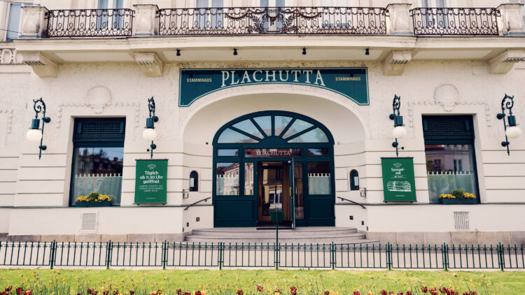 Distinguished entrance of Plachutta Stammhaus Hietzing featuring classic signage and architectural elements.