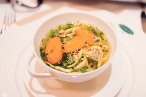 Traditional soup with bone marrow and vegetables.