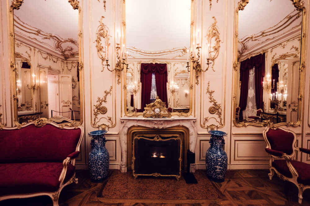 Historic baroque room at Schönbrunn Palace (Schloss Schönbrunn), imperial Habsburg palace interior with ornate period furniture and elaborate rococo decorations.