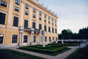 Schönbrunn Palace west facade with formal baroque gardens.