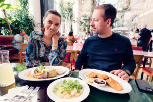 Traditional Austrian dish beautifully presented at Brasserie Palmenhaus, showcasing local flavors.