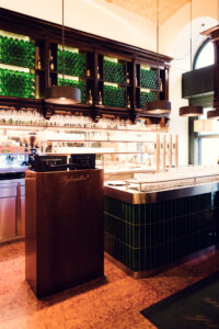 Bar at Figlmüller Bäckerstrasse, offering a selection of Austrian wines and spirits.