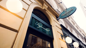 Welcoming entrance of Figlmüller Bäckerstrasse, a culinary landmark in Vienna.