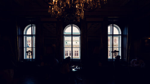 Elegant and inviting interior of Gerstner K. u. K. Hofzuckerbäcker, perfect for a leisurely afternoon.