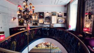 Opulent interior of Gerstner K. u. K. Hofzuckerbäcker, adorned with luxurious furnishings and elegant decor.