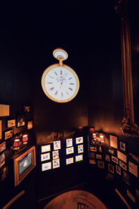 Grand staircase at Gerstner K. u. K. Hofzuckerbäcker, leading to elegant dining areas.