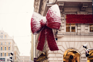 Stylish tie sculpture creating perfect frames for modern portraits.