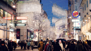Winter magic on Kärntner Straße, where festive lighting and delicate snowflakes create a fairytale atmosphere.