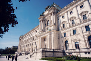 Hofburg Palace framed by the serene landscape of Burggarten, offering a peaceful retreat in the city.
