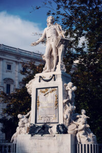 Iconic Mozart statue in Burggarten, a tribute to the legendary composer set amidst beautiful gardens.