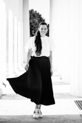 Adriana at Theseustempel Vienna surrounded by classical Greek revival architecture.