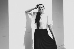 Adriana at Theseustempel Vienna surrounded by classical Greek revival architecture.