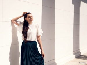 Adriana at Theseustempel Volksgarten Vienna with historic temple and natural lighting.