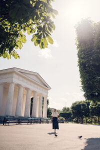 Adriana at Theseustempel Vienna featuring neoclassical monument and park setting.