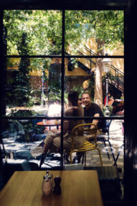 Adriana and Mario in Café Friedlich's beautiful garden setting.