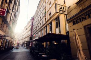 Historic facade of Café Hawelka in Dorotheergasse, where original signage and weathered walls tell stories of literary Vienna.