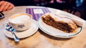 Classic Viennese pairing at Hawelka: house-made Apfelstrudel alongside Melange.