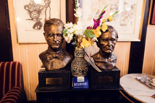 Touching tribute to Leopold and Josefine Hawelka: bronze statue capturing the café's legendary founders.