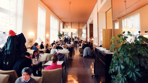 Iconic chairs and tables at Café Prückel, preserving authentic 1950s café aesthetics.