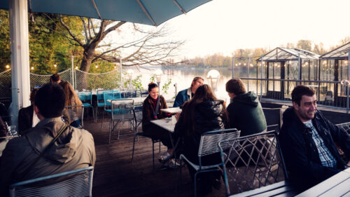 Waterfront terrace at Das Bootshaus, where minimalist design meets stunning Old Danube views.