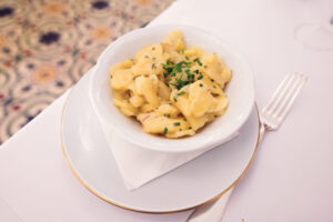 Homemade potato salad at Meissl & Schadn, traditionally seasoned and perfect with schnitzel.