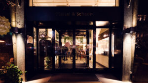 Inviting entrance of Meissl & Schadn, where golden lettering promises traditional Viennese hospitality.