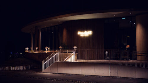 Elegant entrance of Rondell Café am Cobenzl, where Art Deco details meet panoramic city views.