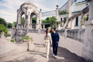 Adriana and Mario at Vienna's Stadtpark, where historic pathways and blooming flowers create perfect photo opportunities.