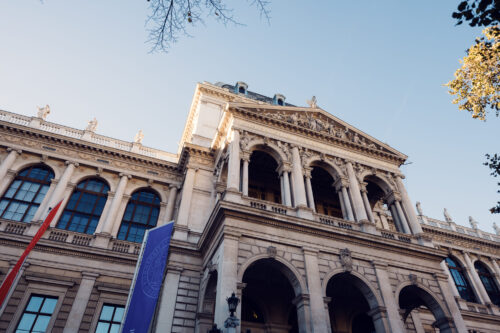 The monumental facade of the Univerity of Vienna along the Ring offers perfect photography opportunities in soft evening light.
