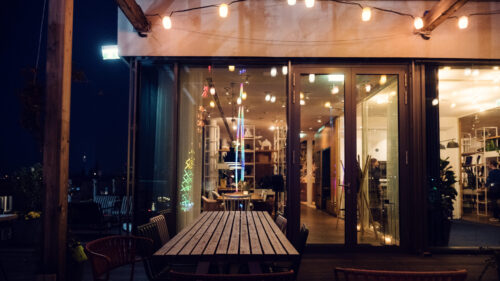 Stunning rooftop terrace at ZOKU Vienna offering panoramic city views.