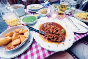 Traditional Vienna cut served with roasted potatoes and house-made sauce at Martin Sepp.