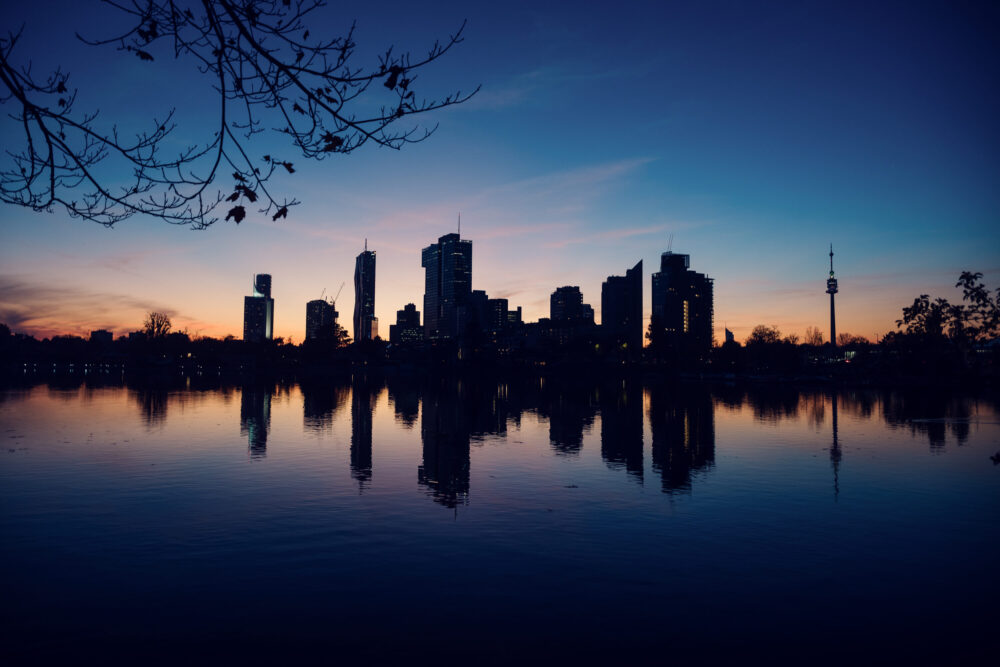 Evening view of Vienna urban landscape from Alte Donau.