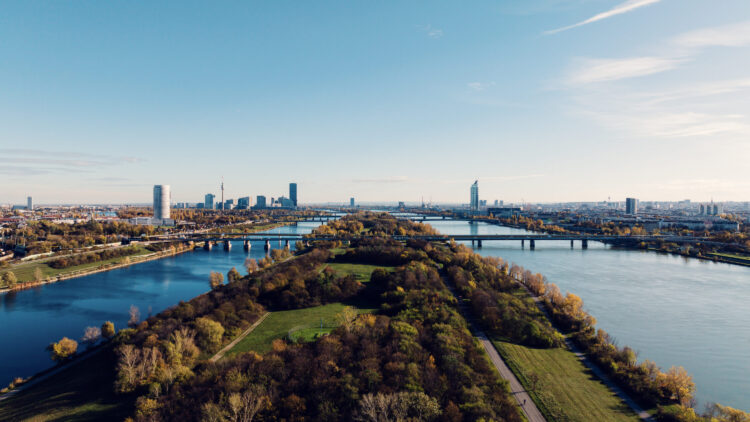 Donauinsel Vienna aerial view showing 21-kilometer artificial island between Danube River and New Danube waterway.